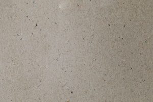 Detalle de textura de papel vergé de alta calidad para cuadernos artesanales en miniatura