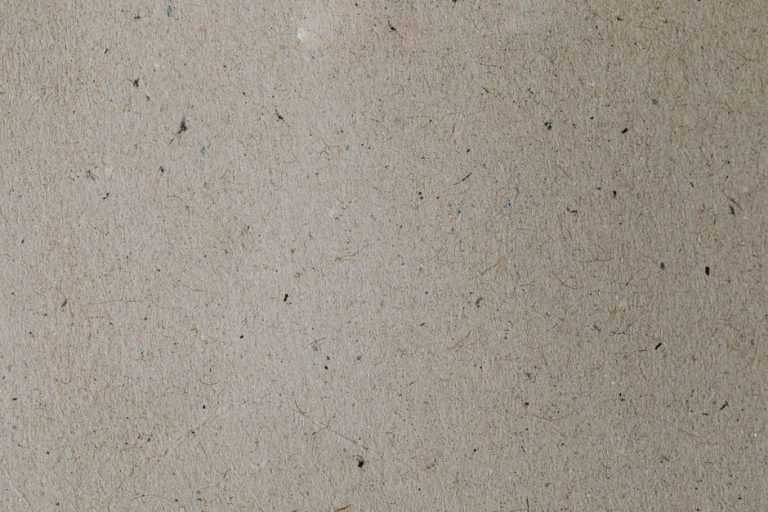 Detalle de textura de papel vergé de alta calidad para cuadernos artesanales en miniatura