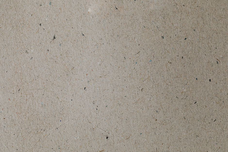 Detalle de textura de papel vergé de alta calidad para cuadernos artesanales en miniatura