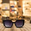 Gafas de sol mujer oversize negras con lente degradado violeta