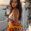 Bolso cesta amarillo con pompones rojos y flores de ganchillo de colores, estilo boho Bolso cesta amarillo con pompones rojos y flores de ganchillo de colores, estilo boho