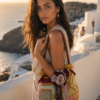 Bolso saco patchwork de telas damascadas en oro, rosa y burdeos con flor, estilo barroco vintage