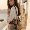 Bolso saco patchwork de telas damascadas en oro, rosa y burdeos con flor, estilo barroco vintage